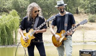 Kirk Hammett and Cesar Gueikian play their respective 'Burst Les Pauls