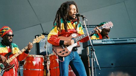 Aston 'Family Man' Barrett and Bob Marley perform on stage at Crystal Palace Bowl on June 7th, 1980 in London.