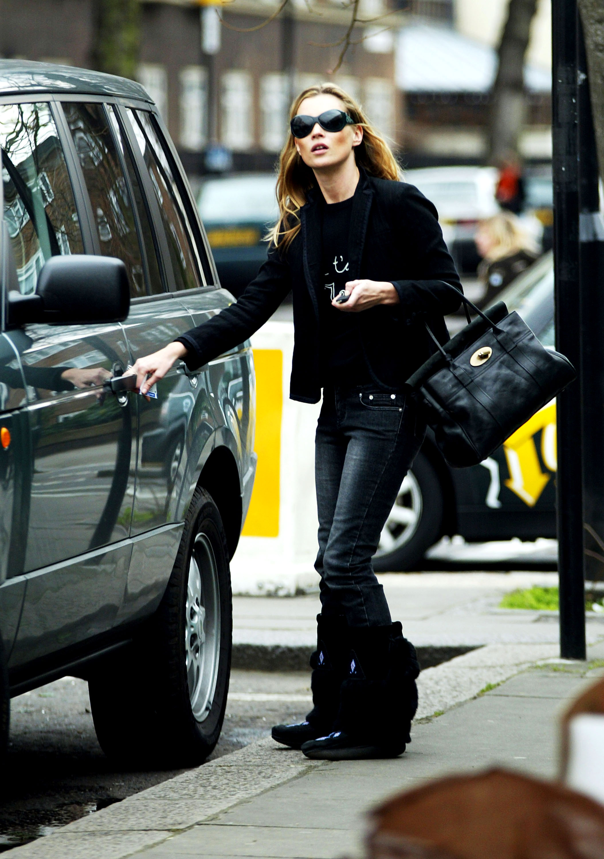 Kate Moss is seen in Notting Hill before meeting an unidentified friend for lunch at Zucca March 10, 2004