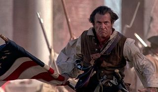 The Patriot Mel Gibson rampages with a flag