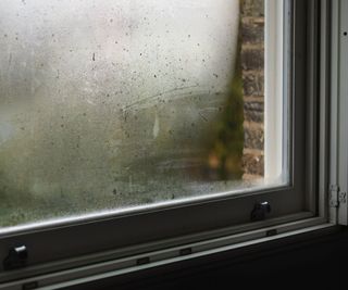 Foggy condensation between panes of glass in a double glazed window