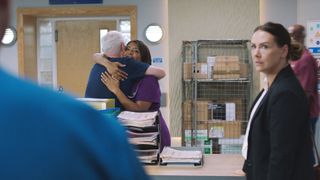 Zoe embraces Charlie in Casualty.