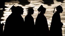 Graduates arrive for the commencement ceremony at the University of Maryland.