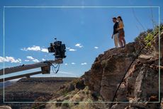 Where is Wilderness filmed as illustrated by a picture of cast filming in the desert.