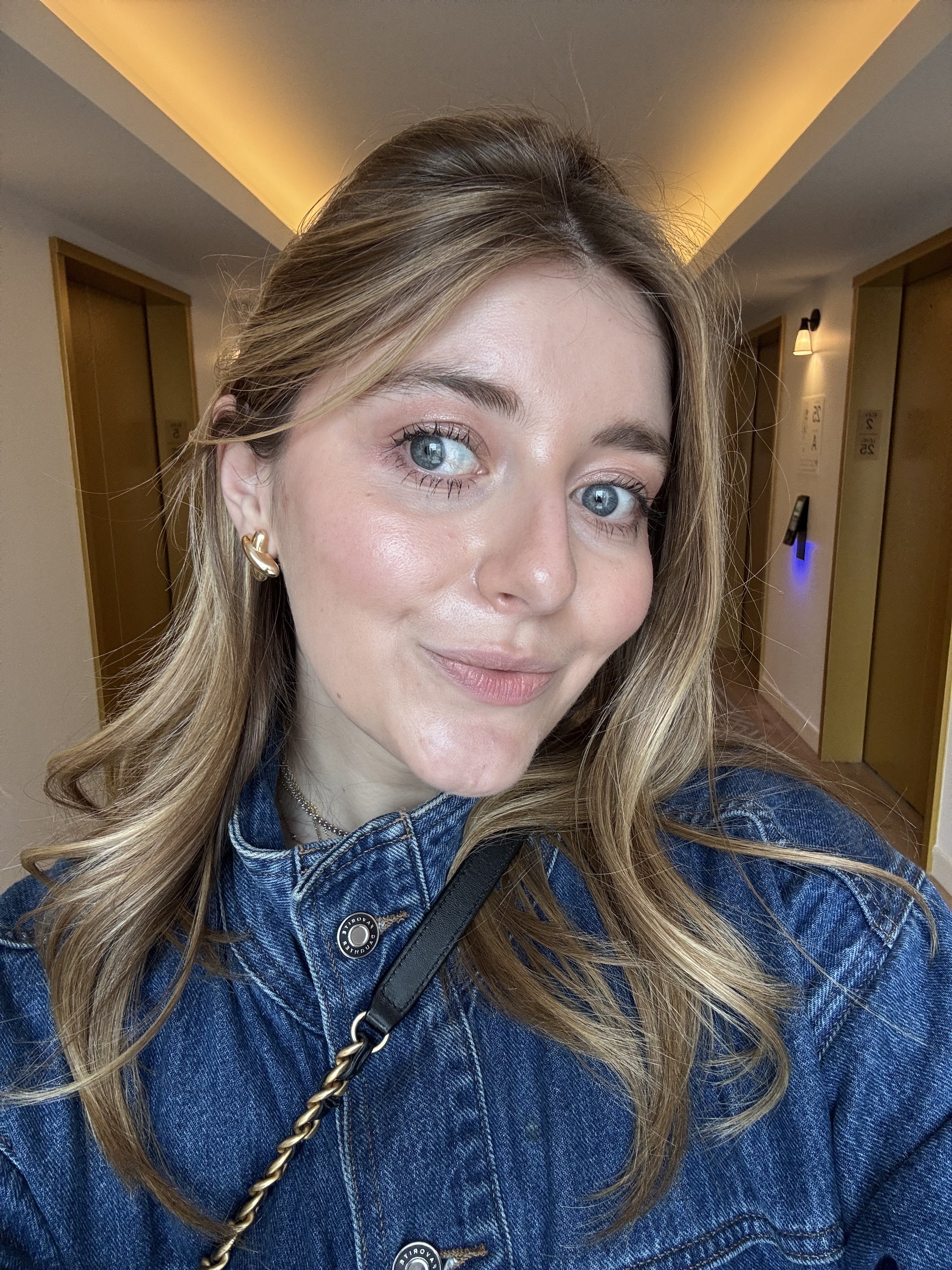 samantha holender volumizing routine for fine hair, a blonde woman wearing a denim shirt