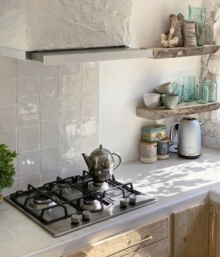 Rustic white kitchen with tiled kitchen worktops