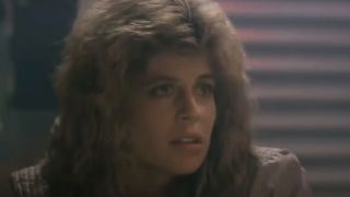 Linda Hamilton as Sarah Connor with big hair in Tech Noir in The Terminator