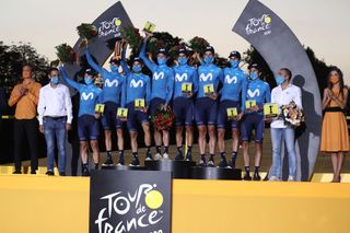 Team Movistar riders celebrate winning the teams overall ranking at the end of the 21st and last stage of the 107th edition of the Tour de France cycling race 122 km between ManteslaJolie and Champs Elysees Paris on September 20 2020 Photo by KENZO TRIBOUILLARD AFP Photo by KENZO TRIBOUILLARDAFP via Getty Images