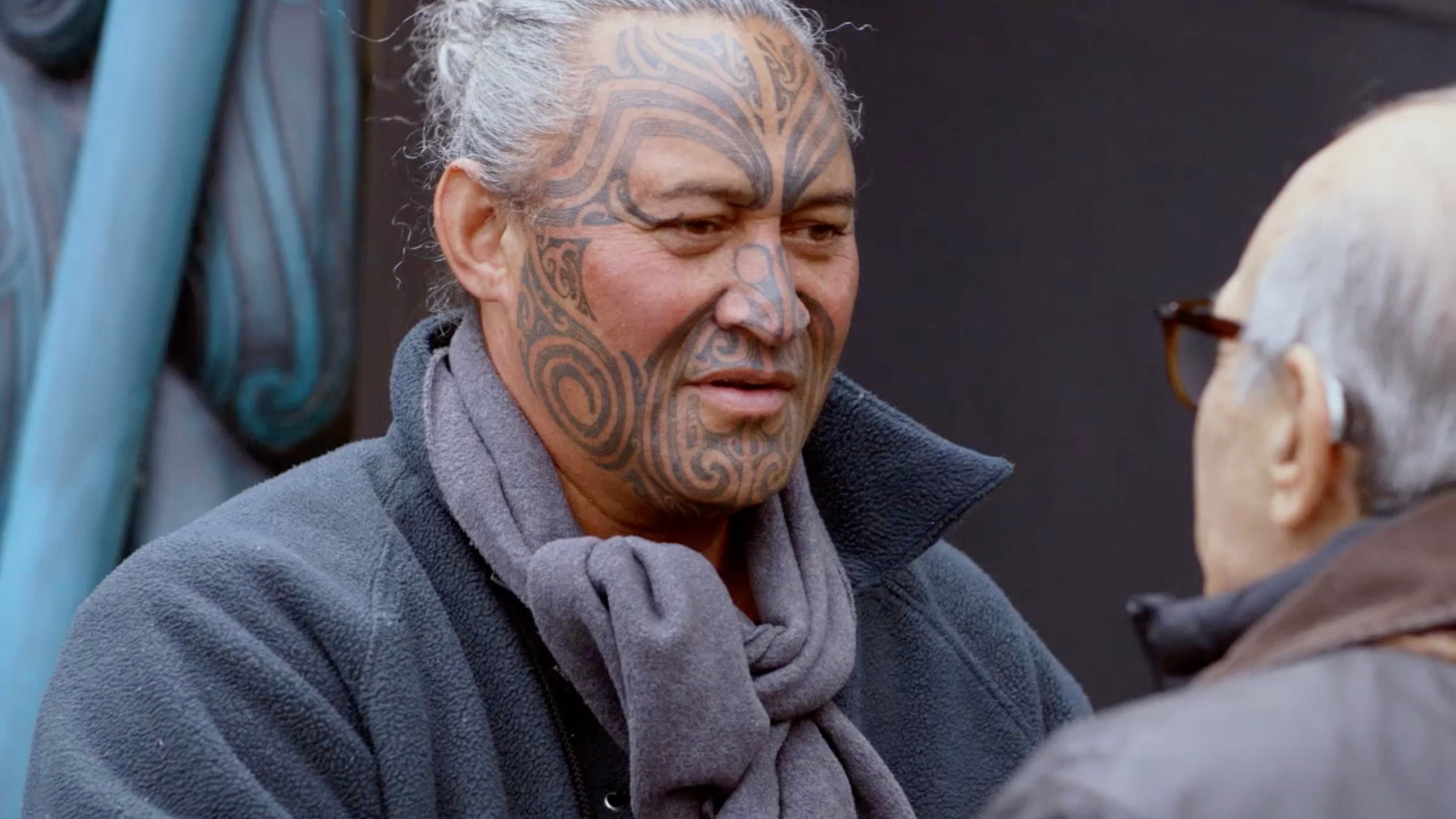 A Māori man speaks to Sir David Suchet in Travels with Agatha Christie and Sir David Suchet.