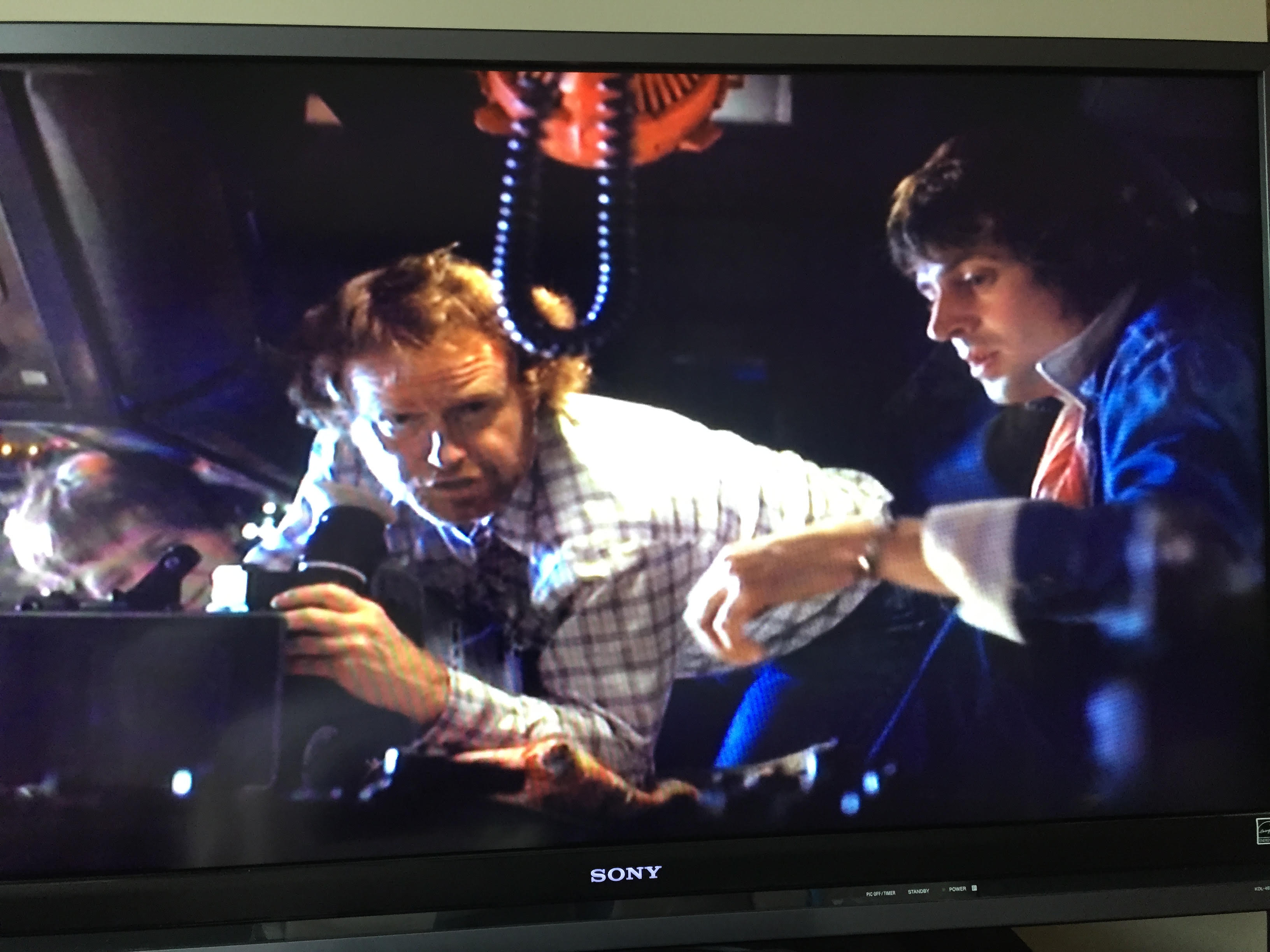 a film director and a set designer on a film set