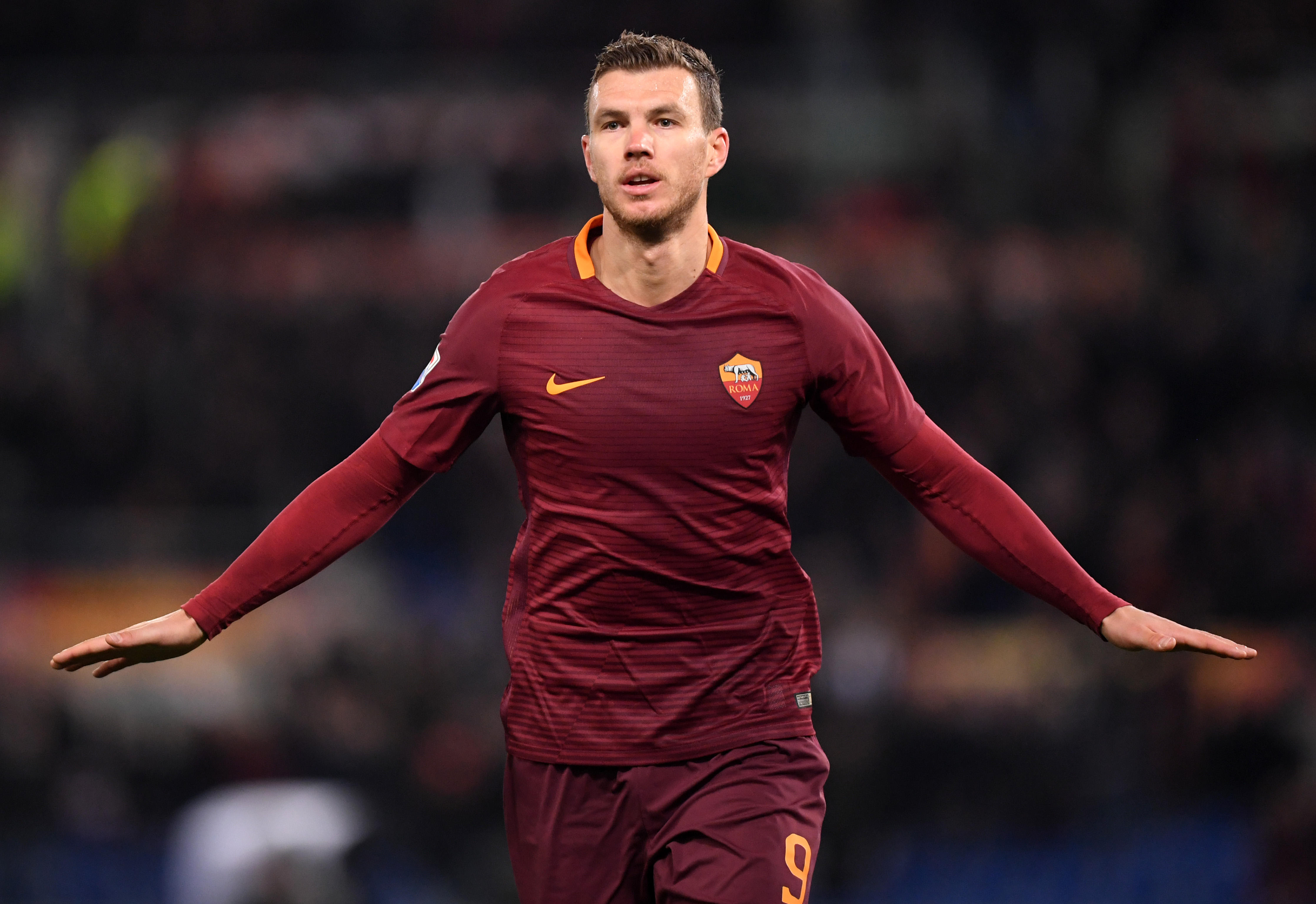 Edin Dzeko celebrates after scoring for Roma, 2017