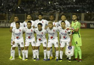 Alianza FC players line up ahead of a CONCACAF Champions League match against Monterrey in 2019.