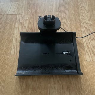 Dyson WashG1 dock with wet puddles on it