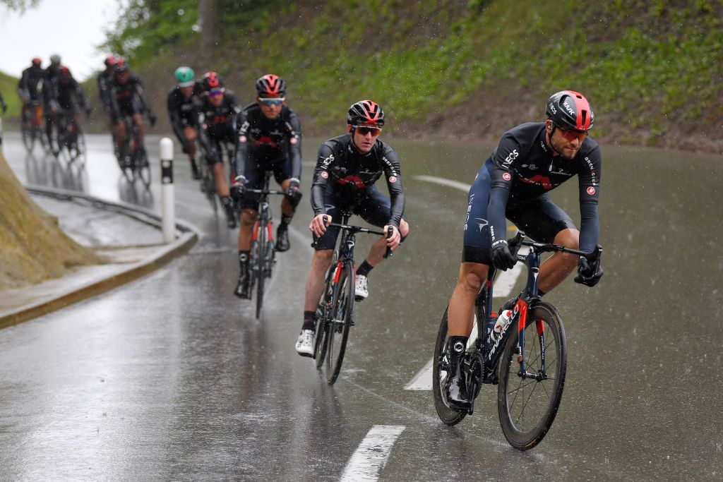 ESTAVAYER SWITZERLAND APRIL 30 Eddie Dunbar of Ireland and Team INEOS Grenadiers Filippo Ganna of Italy and Team INEOS Grenadiers during the 74th Tour De Romandie 2021 Stage 3 a 1687km stage from Estavayer to Estavayer Rain TDR2021 TDRnonstop UCIworldtour on April 30 2021 in Estavayer Switzerland Photo by Luc ClaessenGetty Images