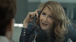 Laura Dern as a playwright on the prison phone with Cameron Todd Willingham in Trial by Fire.