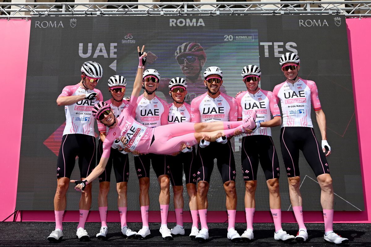 Tadej Pogačar and his team celebrate at the team presentation before the start of stage 21 of the Giro d'Italia 2024