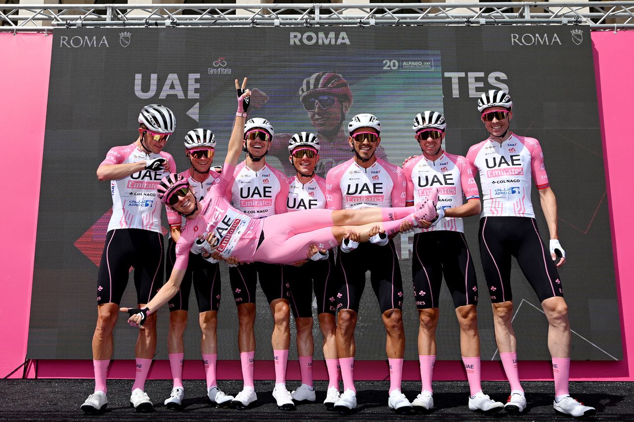 Tadej Pogačar and his team celebrate at the team presentation before the start of stage 21 of the Giro d'Italia 2024