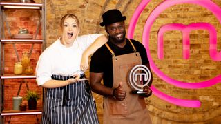 Poppy O'Toole and Kerth Gumbs poses with the Masterchef trophy