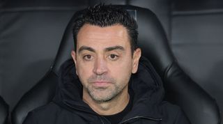 Barcelona coach Xavi looks on during his side's 4-1 defeat to Real Madrid in the Supercopa in January 2024.