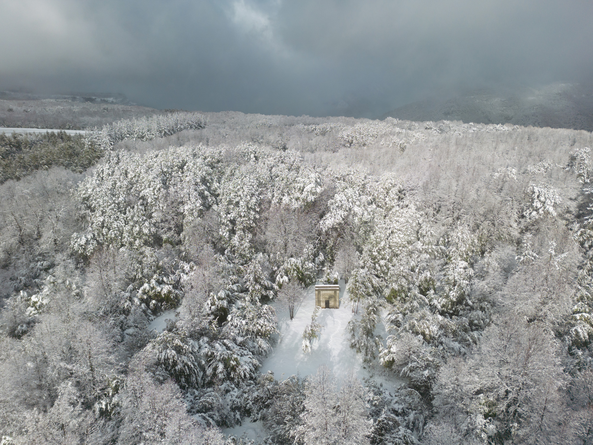 Miel Pavilion, a small, concrete chilean pavilion by Pezo von Ellrichshausen set in the countryside