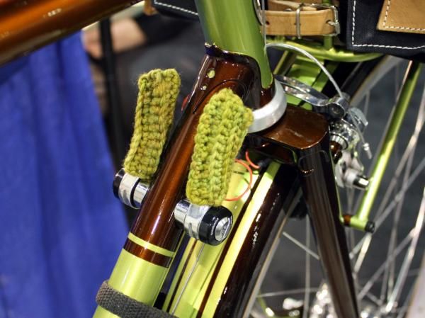 Yipsan wrapped the down tube shifters with knit socks.