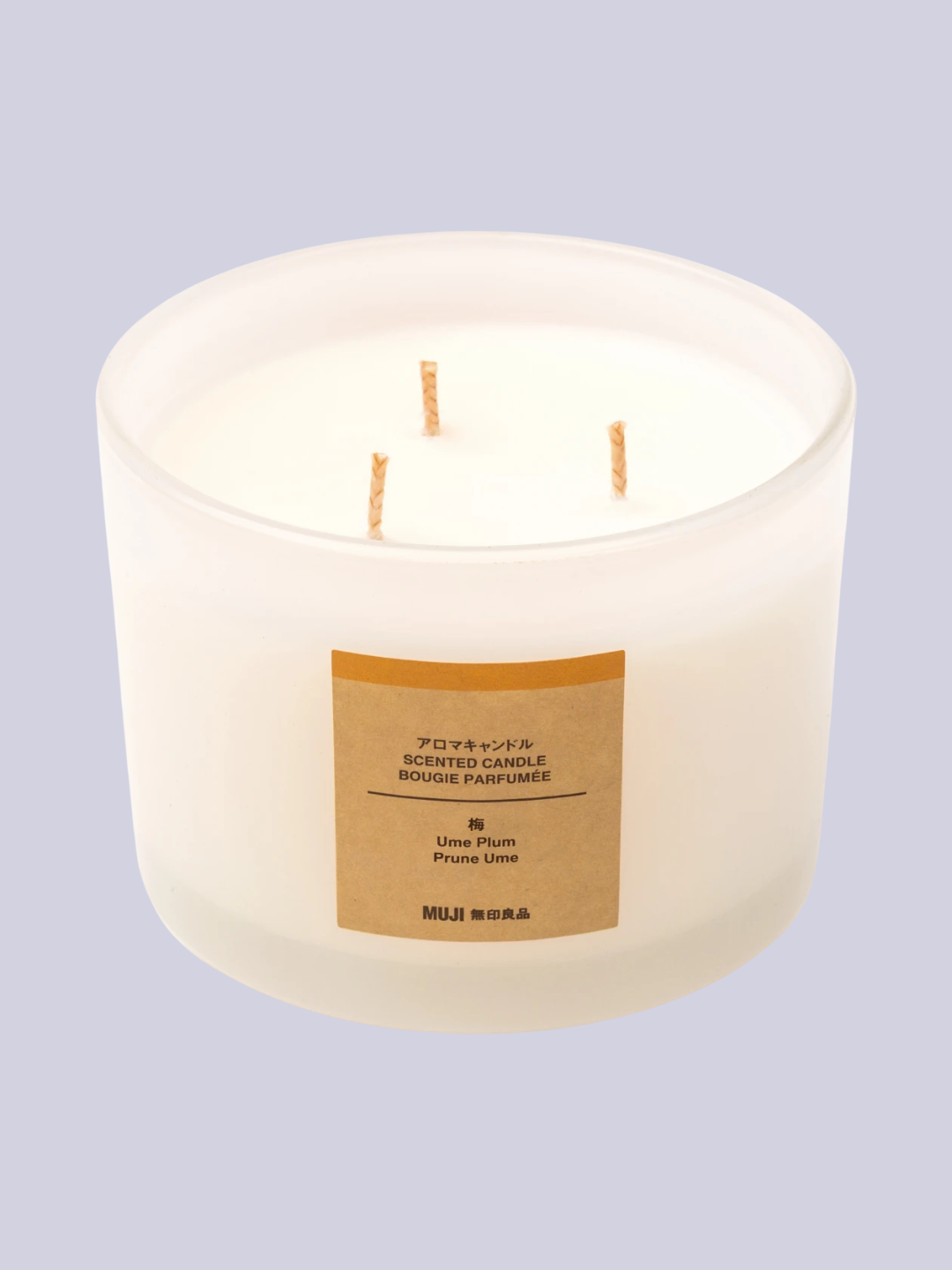 A glass ume plum scented candle from MUJI