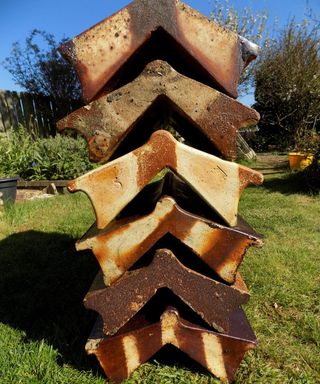 Roof tiles stacked on top of one another