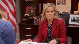 Leslie Knope (Amy Poehler) confronted at desk in Parks and Recreation