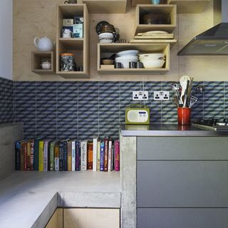 kitchen area with worktop and wall shelves