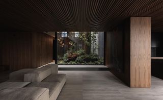 Dark woods and concrete floors at the Vancouver House Penthouse