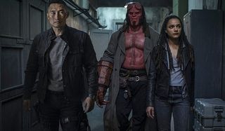 Hellboy and his fellow agents investigate a hallway