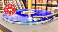 Sony turntable play record with Rewind logo