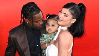Travis Scott, Stormi Webster, and Kylie Jenner attend the premiere of Netflix's "Travis Scott: Look Mom I Can Fly" at Barker Hangar on August 27, 2019 in Santa Monica, California.