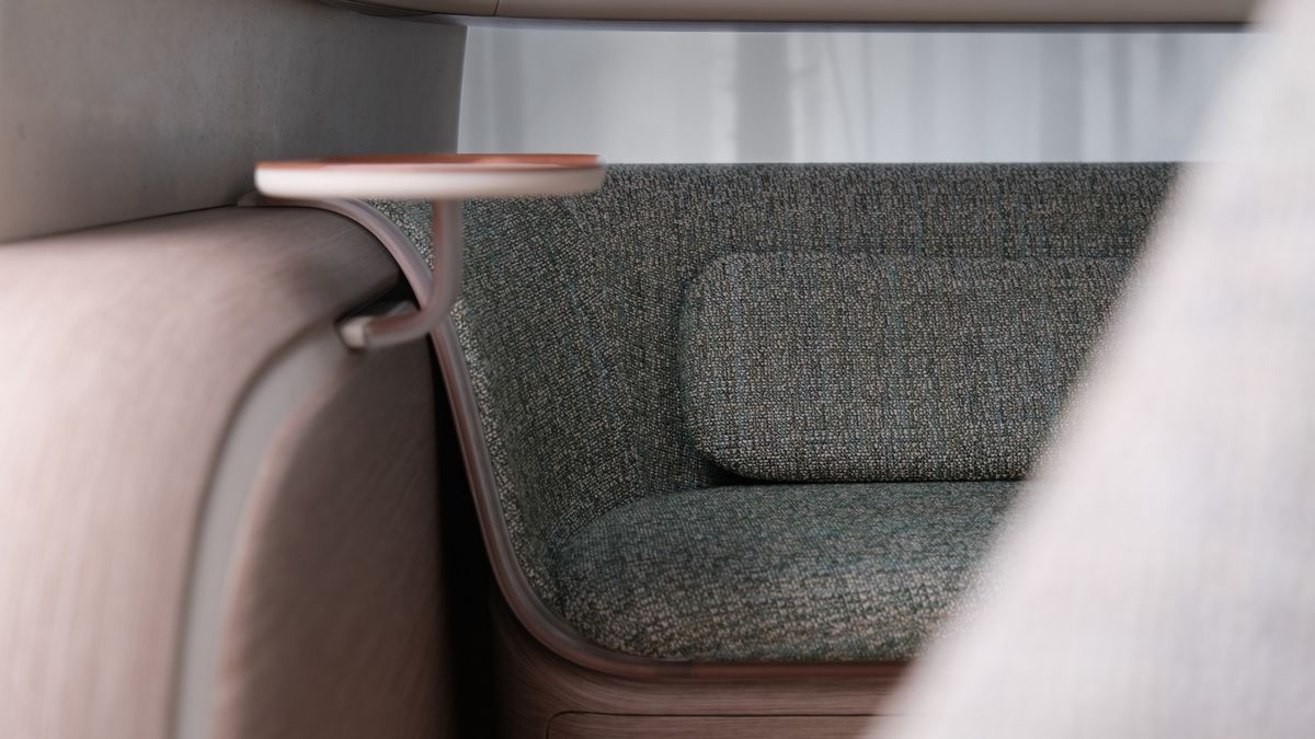 Close up on a modern, lounge-like seat in a car