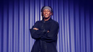 KSI standing with arms folded promo shot
