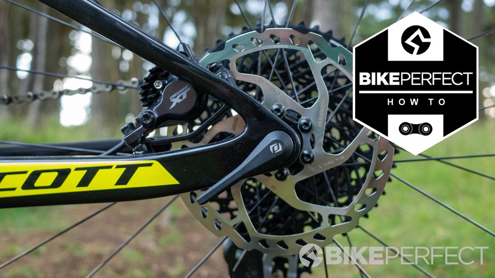 how do you adjust hydraulic disc brakes on a bike