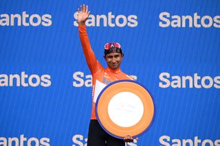 ADELAIDE AUSTRALIA JANUARY 26 Jhonatan Narvaez of Ecuador and UAE Team Emirates Xrg Orange Leader Jersey celebrates at podium as overall race winner during the 25th Santos Tour Down Under 2025 Stage 6 a 90km stage from Adelaide to Adelaide UCIWT on January 26 2025 in Adelaide Australia Photo by Dario BelingheriGetty Images