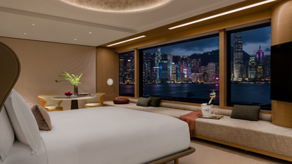 Bedroom at Regent Hong Kong hotel with views over the harbour