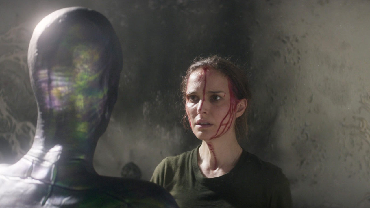 Natalie Portman as Lena in Annihilation (2018), staring into the alien being that is set to assimilate into her.