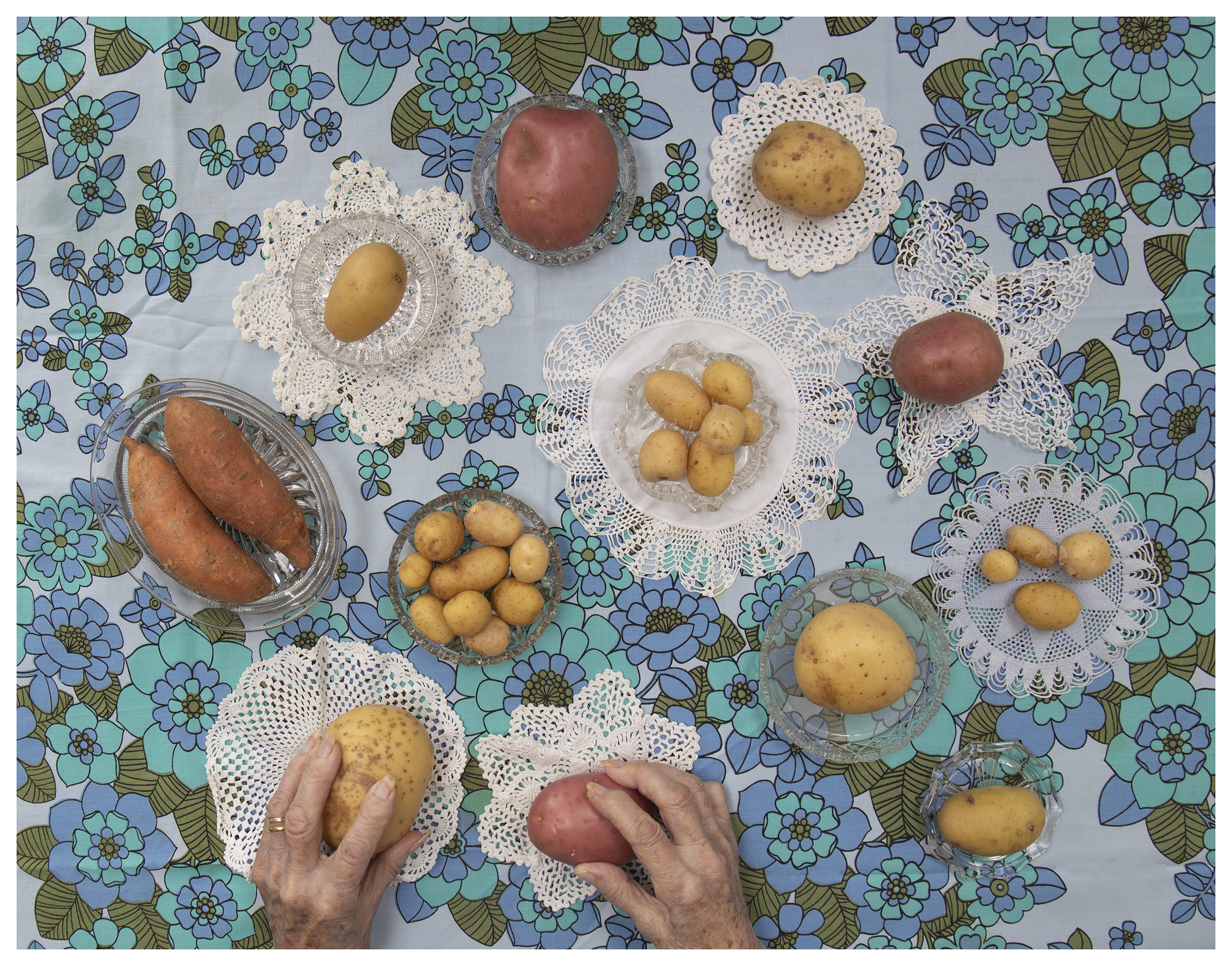 Top-down view of potatoes on a tablecloth