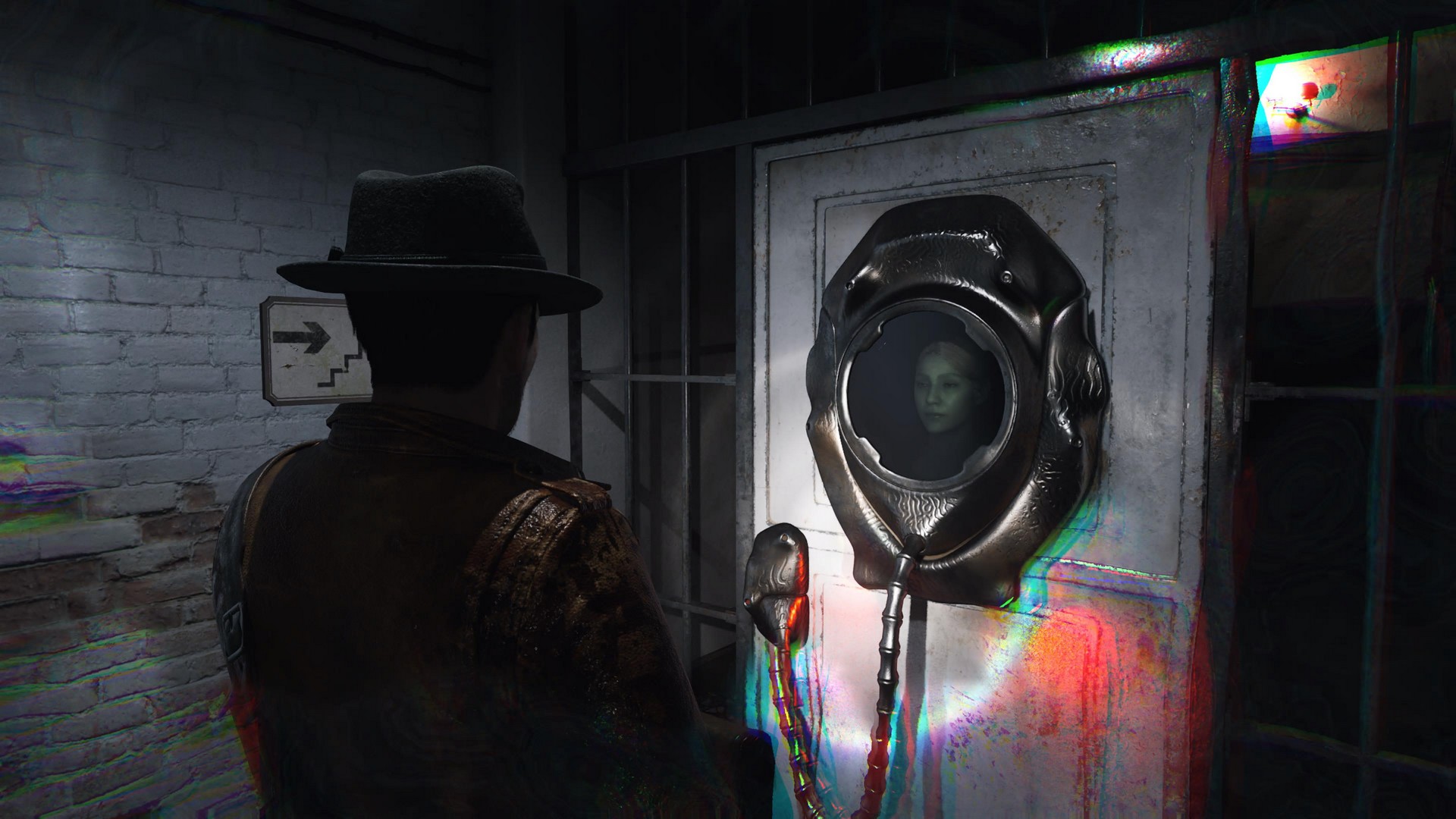 Calvin looks a door sealed by a strange device that has a screen with a woman's face on it in The Sinking City 2
