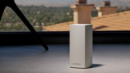 Linksys Atlas Pro 6 (AX5400) review: node on floor by a window