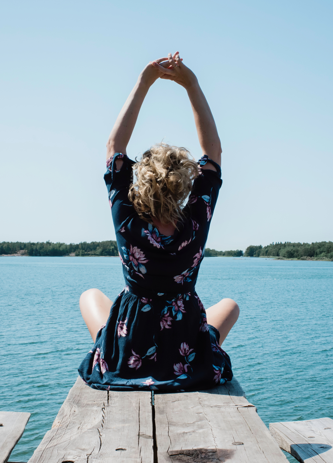 Woman looking over a lake