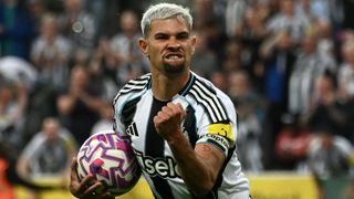 Bruno Guimaraes celebrates after scoring their first goal during the English Premier League football match between Newcastle United and Liverpool at St James' Park in Newcastle-upon-Tyne, north east England on August 25, 2025. 