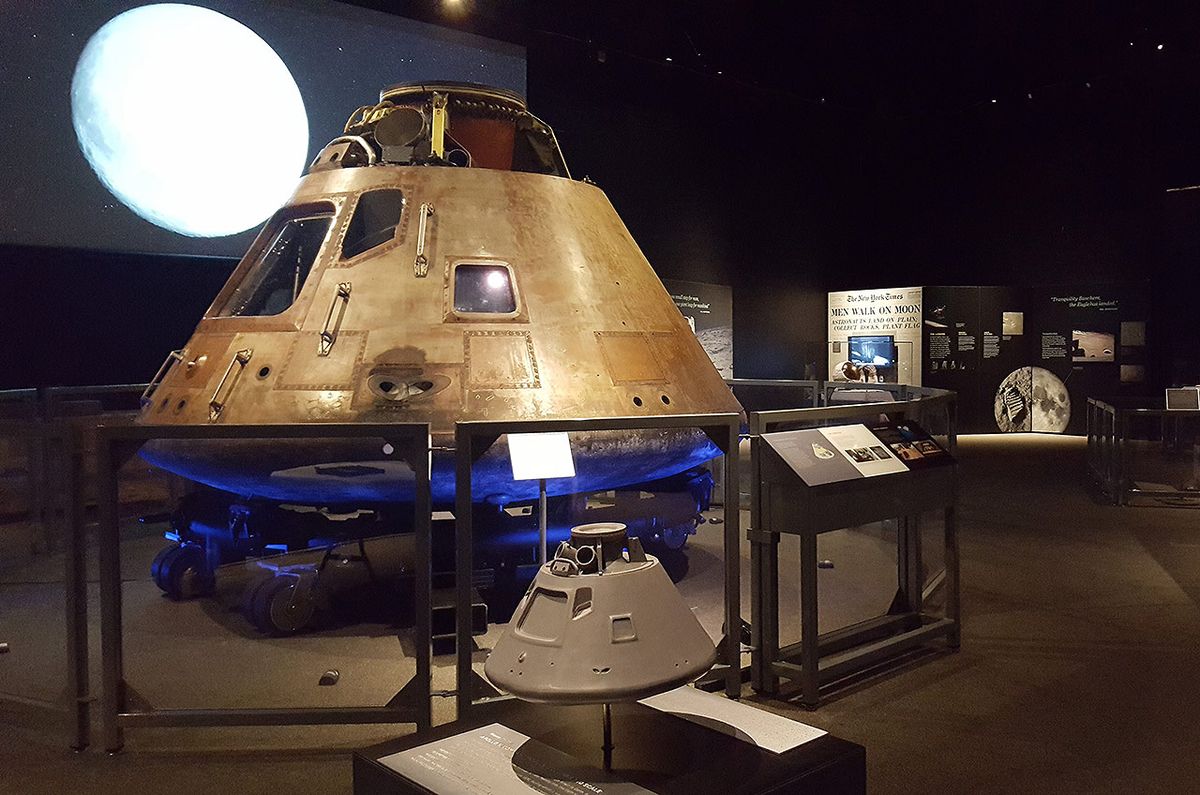 A sensory-assistive scale model of the Apollo 11 command module sits before the real &quot;Columbia&quot; as part of the &quot;Destination Moon: The Apollo 11 Mission&quot; exhibition at the Cincinnati Museum Center in Ohio, open to the public through February 2020.