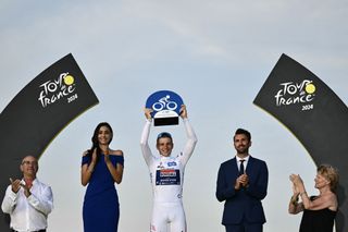 Remco Evenepoel wins the white jersey at the Tour de France 2024.