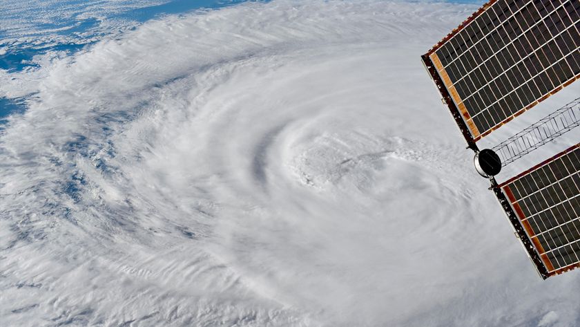 a radial white cloud formation as viewed from above Earth