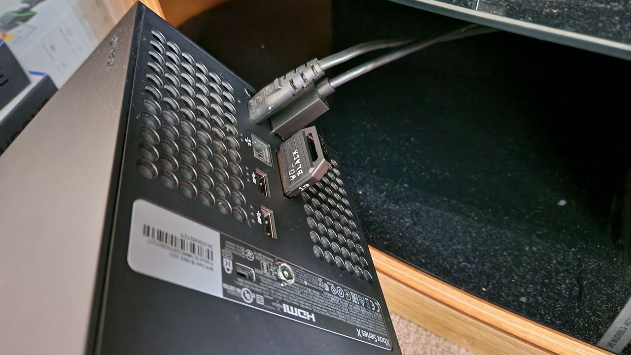 WD Black C50 expansion card in the back of an Xbox Series X