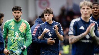 Manchester United players applaud their fans after a 4-3 defeat at Brentford in the Premier League in May 2025.