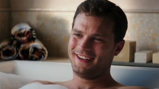 Jamie Dornan in a bathtub scene in Fifty Shades Freed. 